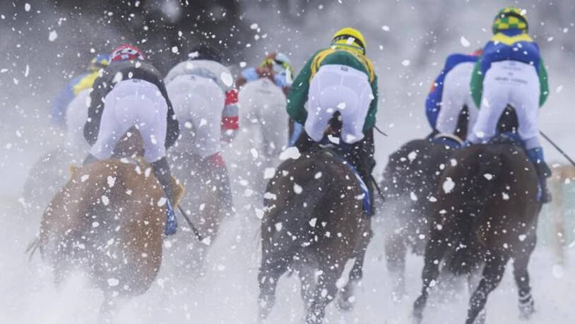 Horses and riders in action during the GP Christoffel Bau Trophy, on the frozen lake on the second weekend of the White Turf races in St. Moritz, Switzerland, on Sunday, February 10, 2019. (KEYSTONE/Peter Klaunzer)