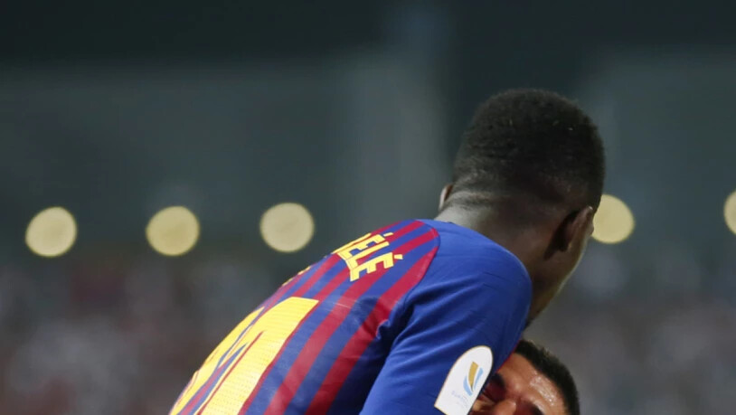 Torschütze Ousmane Dembélé (oben) feiert mit Luis Suarez Barcelonas Siegestor