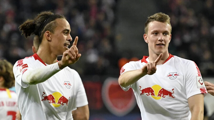 Leipzigs Yussuf Poulsen (links) traf beim Heimsieg gegen Bayer Leverkusen zwei Mal