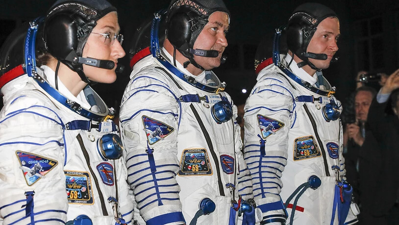 Kurz vor dem Start ihrer Rakete am Donnerstagabend (v.l.): Die Raumfahrer Christina Koch, Alexej Owtschinin und Nick Hague.
