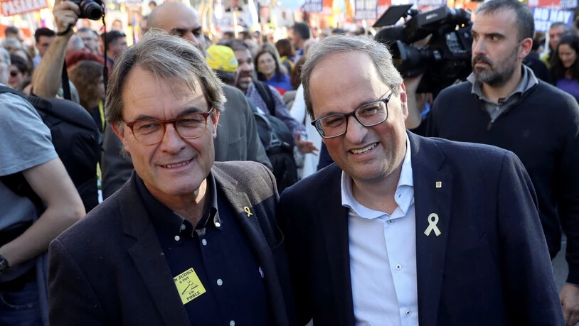 Trugen den Protest der katalanischen Unabhängigkeitsbefürworter erstmals in die Hauptstadt Madrid: Quim Torra (rechts), Präsident des katalonischen Regionalparlaments, und sein Vorgänger Artur Mas (links).