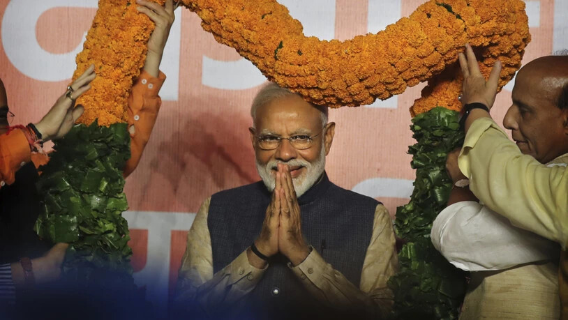 Indiens Premierminister Narendra Modi bekommt mit einem deutlichen Wahlsieg seiner Partei eine zweite Amtszeit.