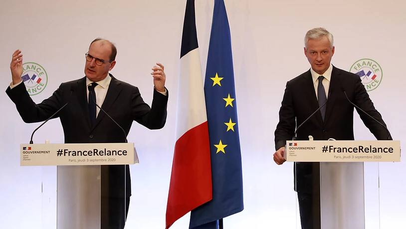 Jean Castex (l), Premierminister von Frankreich, spricht bei einer gemeinsamen Pressekonferenz mit Bruno Le Maire, Wirtschaftsminister von Frankreich. Foto: Ludovic Marin/POOL AFP/AP/dpa