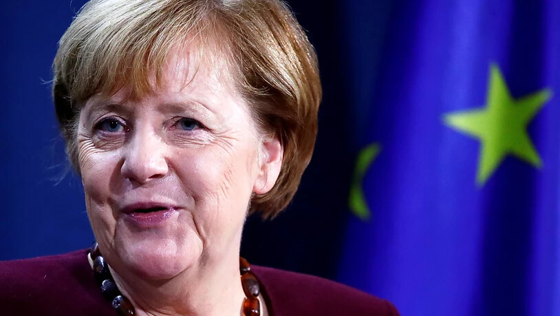 Bundeskanzlerin Angela Merkel (CDU) gibt nach einem virtuellen G20-Gipfeltreffen eine gemeinsame Pressekonferenz mit Bundesfinanzminister Scholz im Bundeskanzleramt. Foto: Hannibal Hanschke/Reuters-Pool/dpa