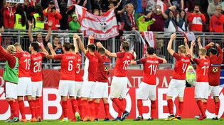 Die Österreicher lassen sich nach ihrem Coup gegen Weltmeister Deutschland feiern