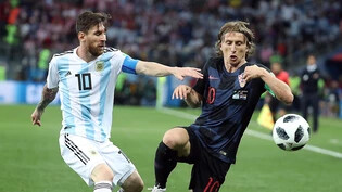 Rivalen in der Meisterschaft, aber auch an der WM: Lionel Messi und Luka Modric