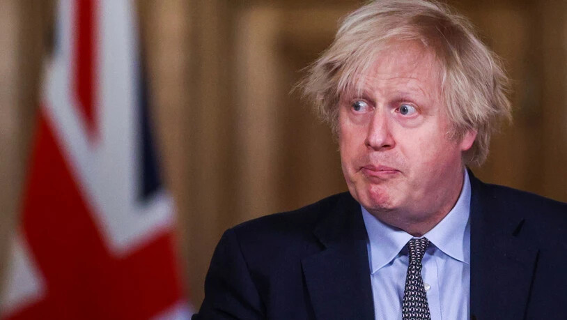 Boris Johnson, Premierminister von Großbritannien, nimmt an einem Medienbriefing zur Corona-Lage in der Downing Street teil. Foto: Hannah Mckay/PA Wire/dpa
