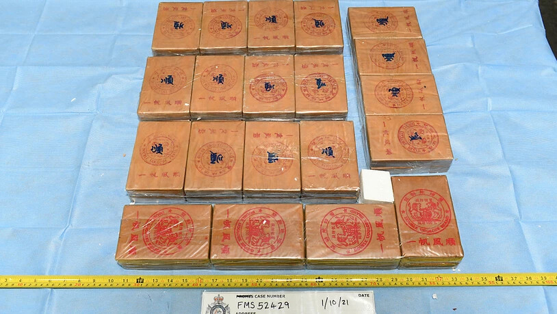 A supplied image obtained on Saturday, October 16, 2021, show 450 kilograms of heroin, with an estimated street value of $140 million. A Malaysian national has been charged after Australian authorities intercepted 450 kilograms of heroin hidden inside a…