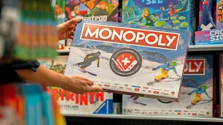 Spielend zur Besitzerin eines Skigebiets werden: Blick auf das neue und nicht ganz unumstrittene Monopoly-Spiel, das seit wenigen Tagen im Handel ist.